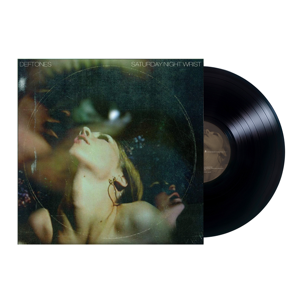 Vinyl record album cover for Deftones’ ’Saturday Night Wrist’ featuring an artistic portrait photograph.