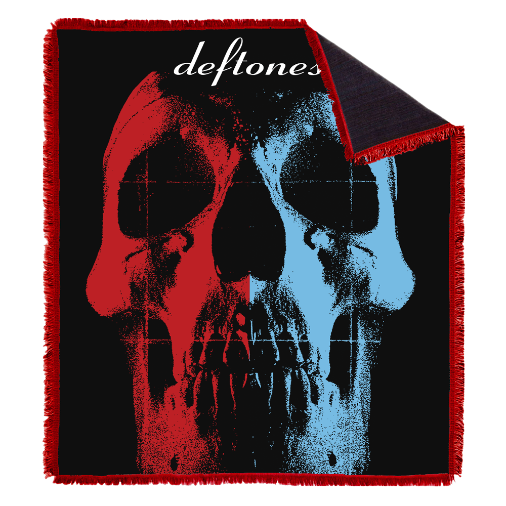 50" x 60" woven cotton and polyester jacquard fringe blanket featuring the Deftones self titled album skull art on one side and red fringe.