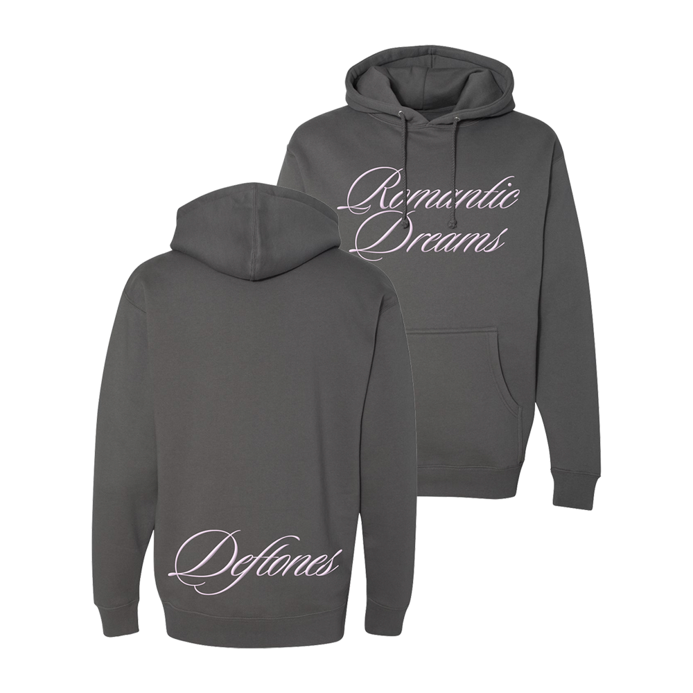 Official Deftones Merchandise. 70% cotton / 30% polyester heavyweight, charcoal gray pullover hoodie. Features a light pink "Romantic Dreams" script puff print on the front and a Deftones puff print script logo on the back.