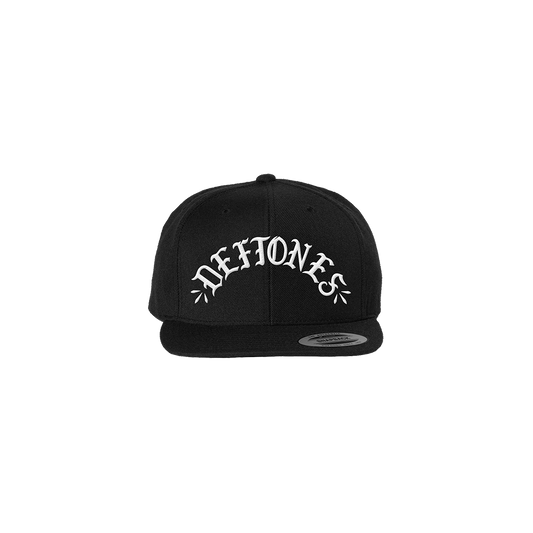 Official Deftones Merchandise. 80% acrylic / 20% high profile snap back style hat featuring a puff embroidered Deftones logo on the front.