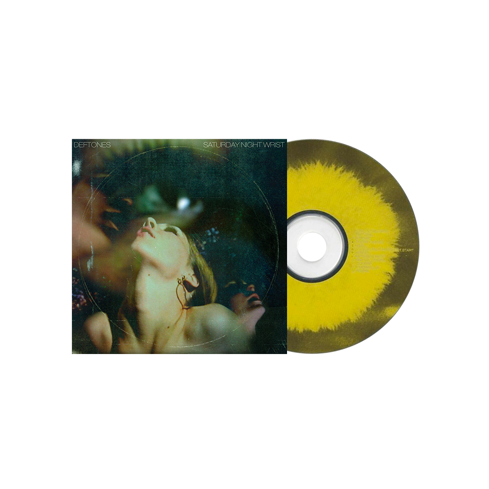 Vinyl record album with cover art and yellow-tinted disc partially visible.