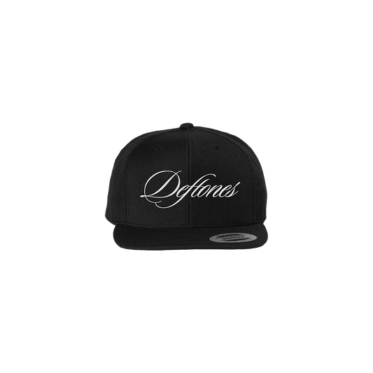 Official Deftones Merchandise. 80% acrylic / 20% high profile snap back style hat featuring an embroidered Deftones logo on the front.